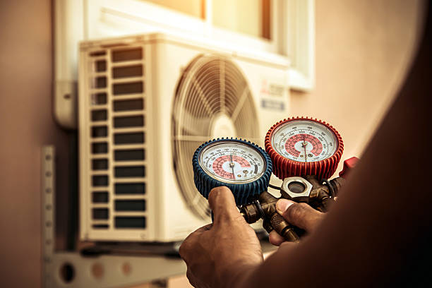 Professional Hvac technician working in Westport, MA